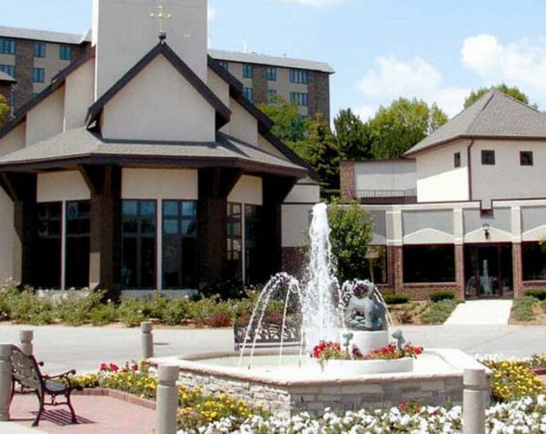 Water fountain and building front at Ascension Living Alexian Village Milwaukee