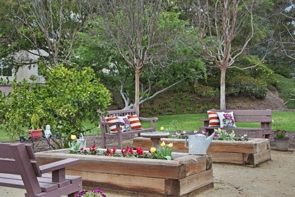 Seating area with Flower Gardens at Sunrise of Mission Viejo