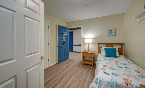 Arden Courts of Fort Myers model residence bedroom