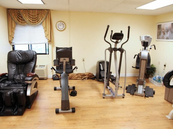 Fitness center and exercise equipment in Regency Retirement Village - Huntsville