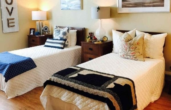 Twin beds in a Parkside Assisted Living and Memory Cottage model residence