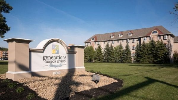 Generations Senior Living of Strongsville community sign with building in the background