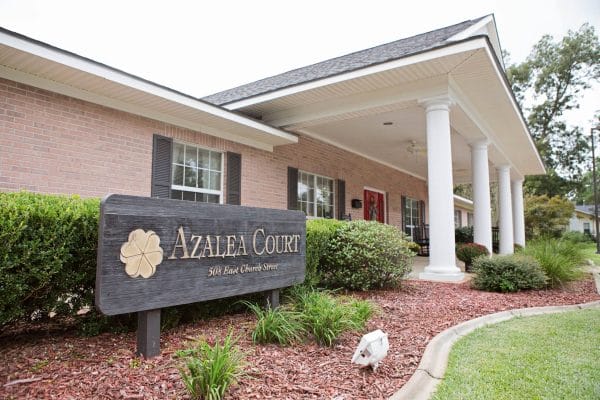 Azalea Court building front, entrance and welcome sign