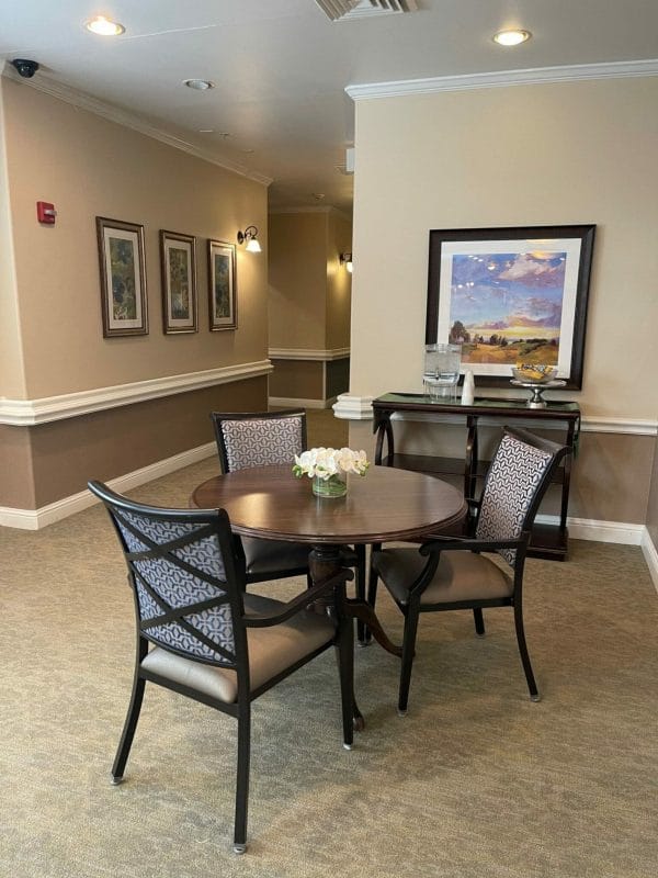 Cafe table in a Charter Senior Living of Orland Park common area