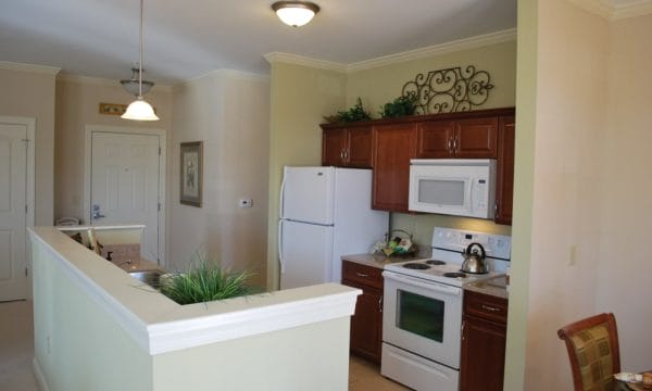 Model kitchen in an apartment at Waltonwood Cary Parkway
