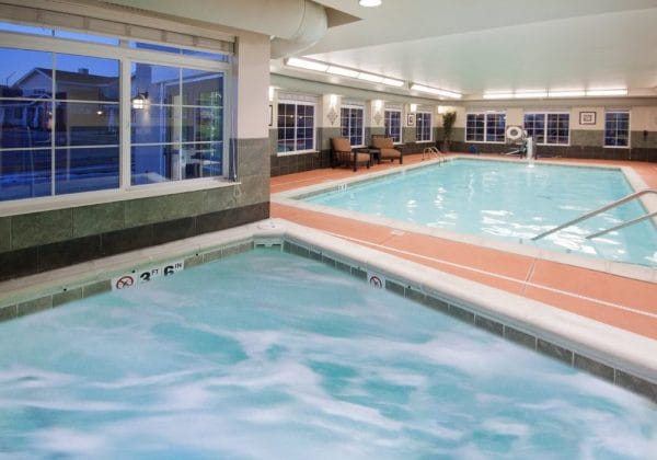 Indoor pool and hot tub in MacKenzie Place at Colorado Springs