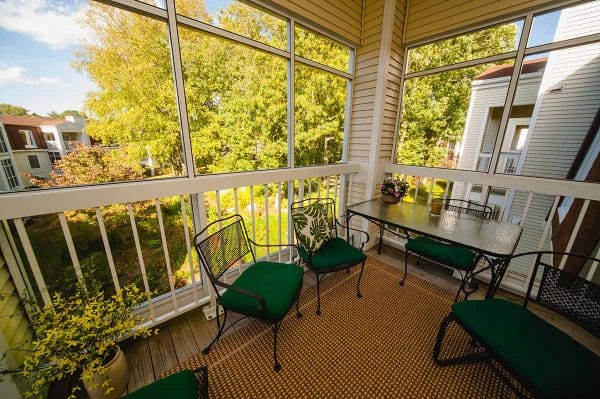 Screened in porch in a Essex Meadows apartment residence