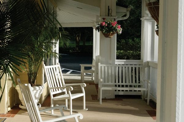 Front porch and rocking chairs at HarborChase of Gainesville