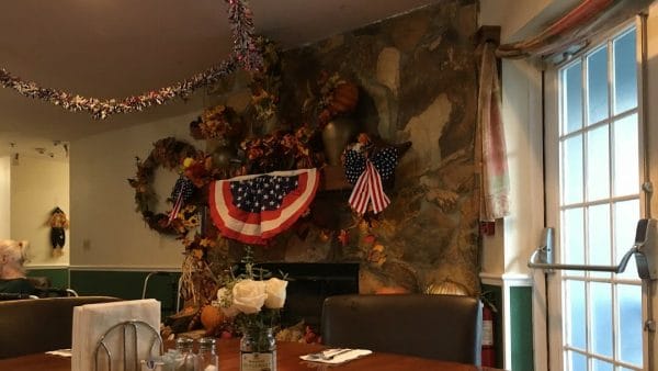 Decorated fireplace in Somerset Assisted Living