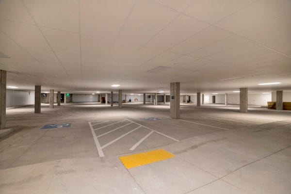 Interior of covered heated parking area at Crescent Senior Living