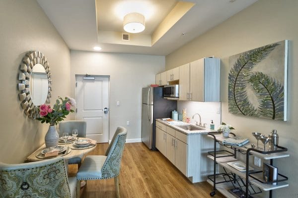Kitchenette and dining area in a Discovery Village at Westchase residence