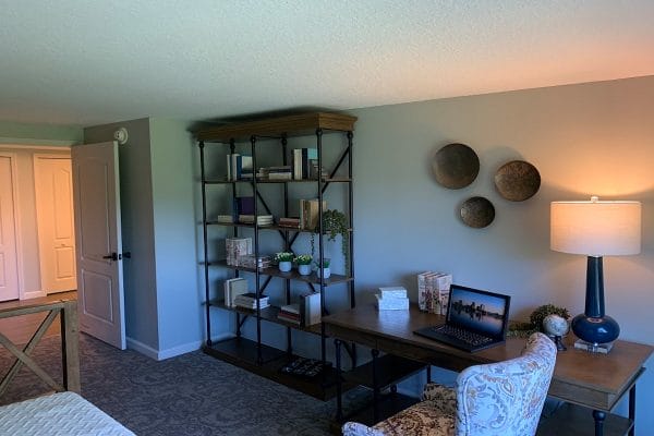 Living room area in a Discovery Village At Stuart model apartment