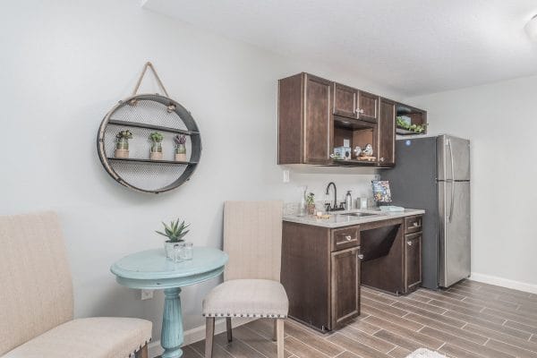 Model apartment dining set and kitchenette in Discovery Village At Stuart