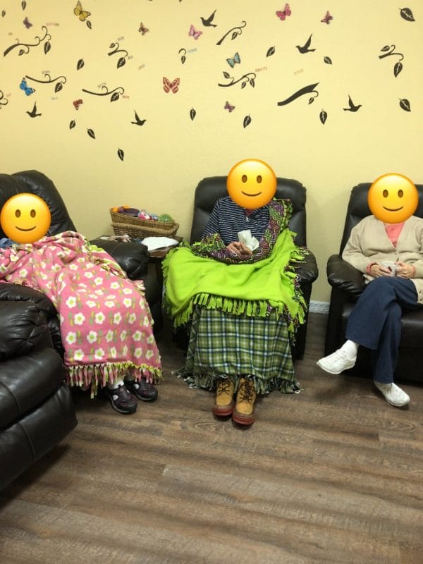 All Smiles Adult Day Care seniors relaxing in lounge chairs