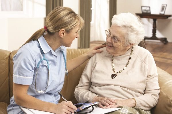 Mindspot Home Health Aid Talking with a Senior