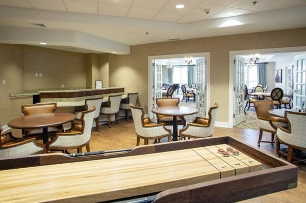 Card tables and shuffle board in the Heatherwood gameroom