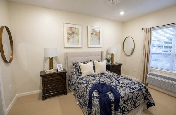 Resident bedroom in a The Westmont at Short Pump model apartment home