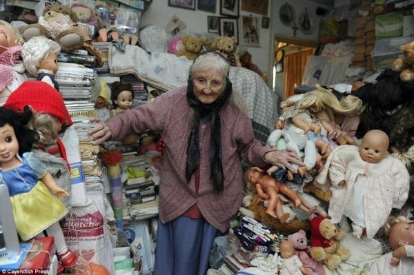 senior woman surrounded by hoarding mess